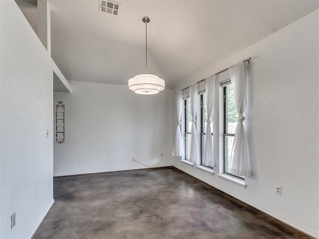 1621 Park View Pl, Edmond, OK 73003 - unfurnished dining area featuring visible vents, baseboards, concrete flooring, and lofted ceiling