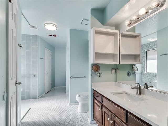 1621 Park View Pl, Edmond, OK 73003 - bathroom with visible vents, a shower, toilet, and vanity