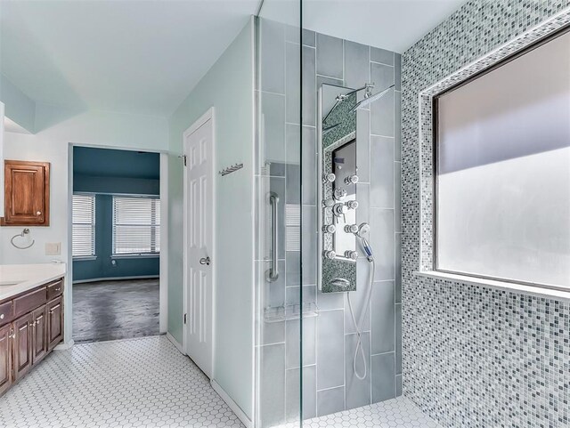 1621 Park View Pl, Edmond, OK 73003 - bathroom with vanity, tile patterned floors, and tiled shower