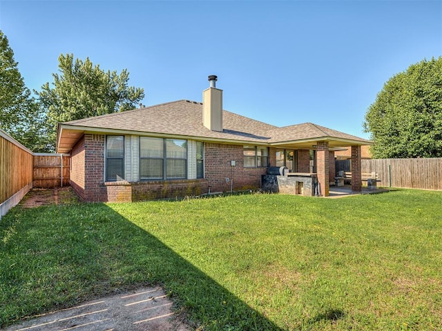1621 Park View Pl, Edmond, OK 73003 - back of house featuring a fenced backyard, a chimney, a patio area, and brick siding