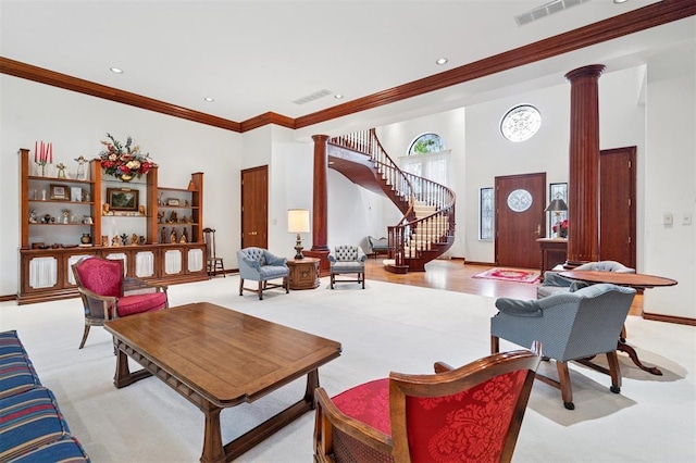 4200 Oakdale Farm Cir, Edmond, OK 73013 - living room with light colored carpet, crown molding, visible vents, and ornate columns
