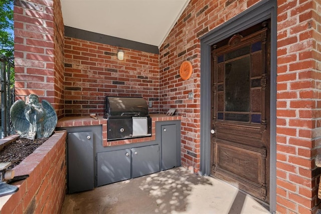 4200 Oakdale Farm Cir, Edmond, OK 73013 - view of patio with exterior kitchen and a grill