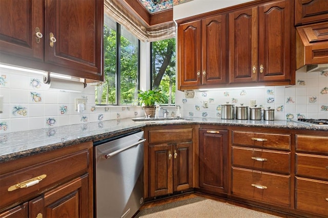 4200 Oakdale Farm Cir, Edmond, OK 73013 - kitchen featuring backsplash, stainless steel appliances, dark stone counters, and a sink