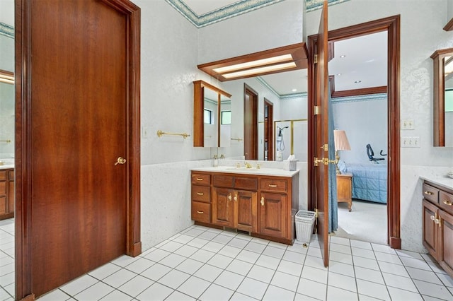 4200 Oakdale Farm Cir, Edmond, OK 73013 - bathroom featuring ornamental molding, ensuite bathroom, tile patterned floors, and vanity