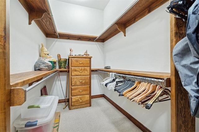 4200 Oakdale Farm Cir, Edmond, OK 73013 - walk in closet featuring light carpet