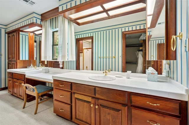 4200 Oakdale Farm Cir, Edmond, OK 73013 - bathroom with vanity, wallpapered walls, and visible vents