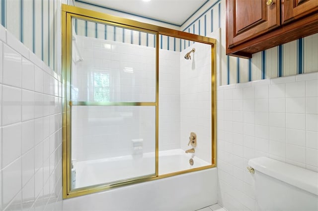 4200 Oakdale Farm Cir, Edmond, OK 73013 - bathroom with combined bath / shower with glass door, tile walls, toilet, and wallpapered walls
