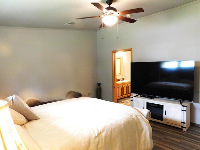 bedroom featuring visible vents, wood finished floors, ceiling fan, and crown molding