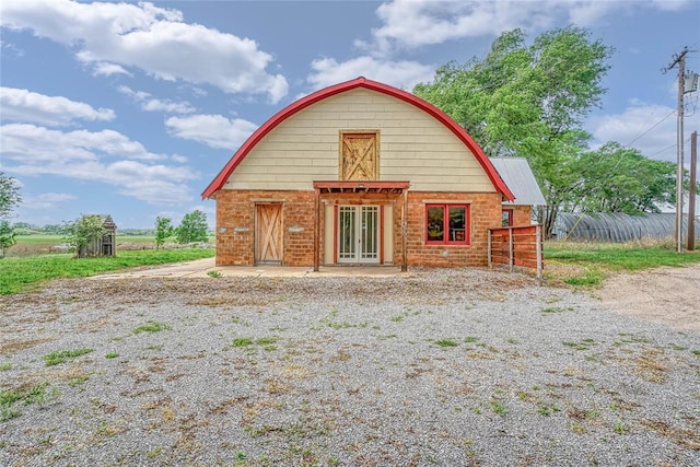 22676 N Rte 66, Clinton, OK 73601 - rear view of property featuring fence and french doors