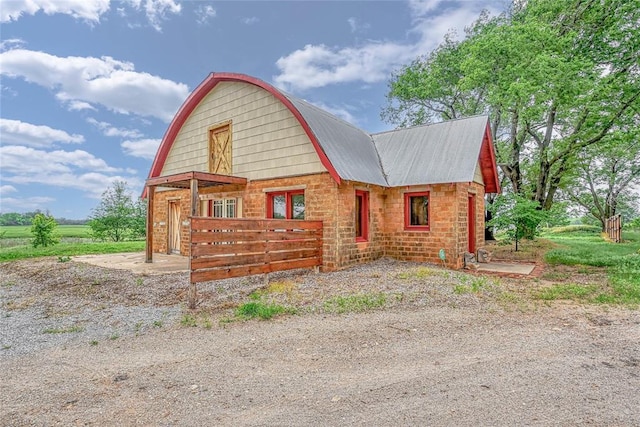 22676 N Rte 66, Clinton, OK 73601 - view of front of house featuring a gambrel roof and metal roof