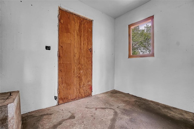 22676 N Rte 66, Clinton, OK 73601 - empty room with concrete floors
