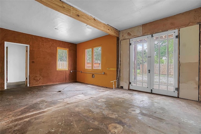 22676 N Rte 66, Clinton, OK 73601 - empty room featuring beamed ceiling and french doors