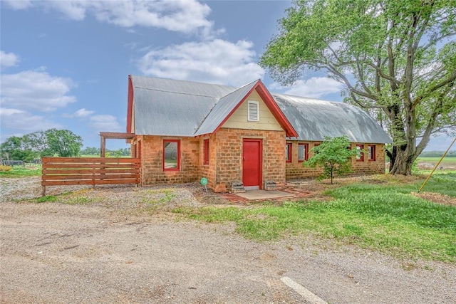 22676 N Rte 66, Clinton, OK 73601 - log cabin featuring fence, metal roof, and stone siding