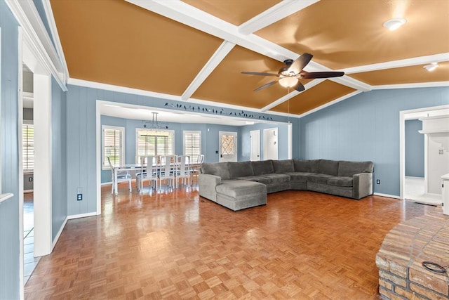 living room with ceiling fan, lofted ceiling with beams, and baseboards