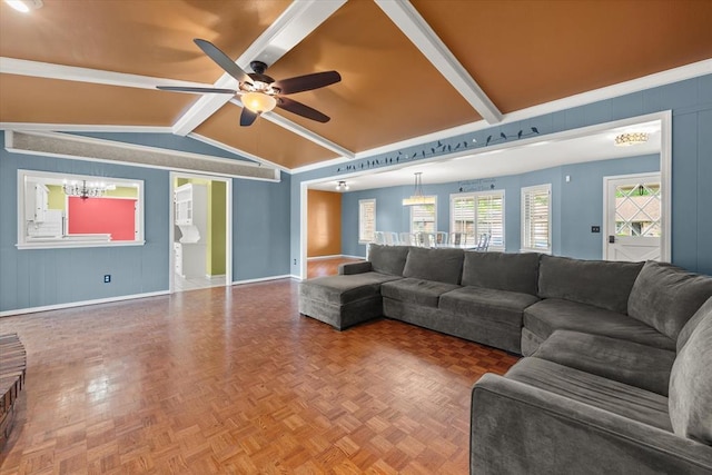 living room featuring baseboards, vaulted ceiling with beams, and ceiling fan with notable chandelier