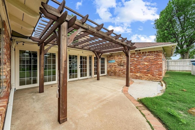view of patio / terrace featuring fence and a pergola
