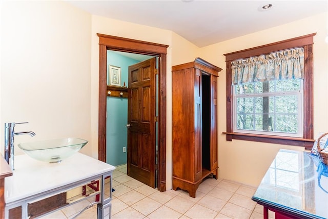 bathroom with vanity and tile patterned floors