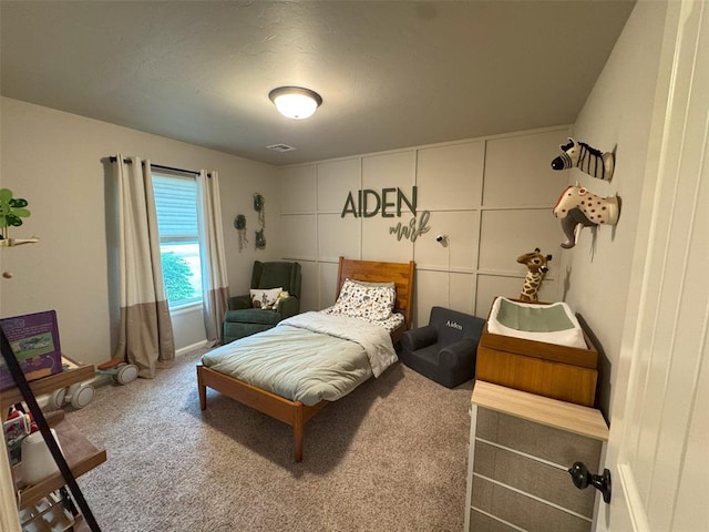 carpeted bedroom with visible vents