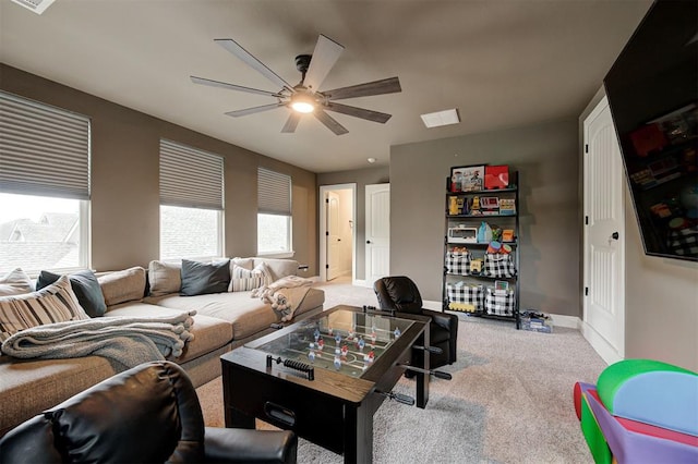2201 Creek Side Cir, Moore, OK 73160 - living area featuring ceiling fan, carpet, and baseboards