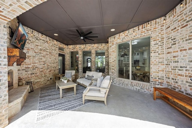 view of patio with ceiling fan and outdoor lounge area