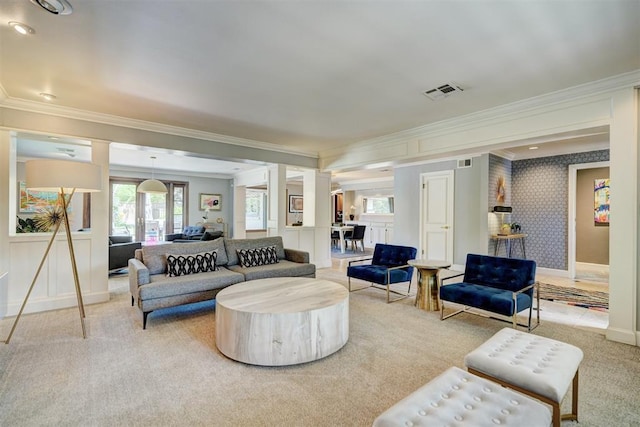 living area with crown molding, carpet, baseboards, and visible vents