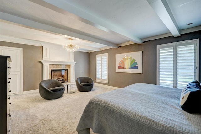 bedroom with carpet flooring, baseboards, beam ceiling, and a high end fireplace