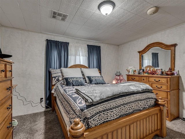 bedroom featuring visible vents