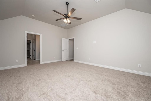 11608 NW 104th St, Yukon, OK 73099 - unfurnished bedroom with visible vents, light colored carpet, and vaulted ceiling