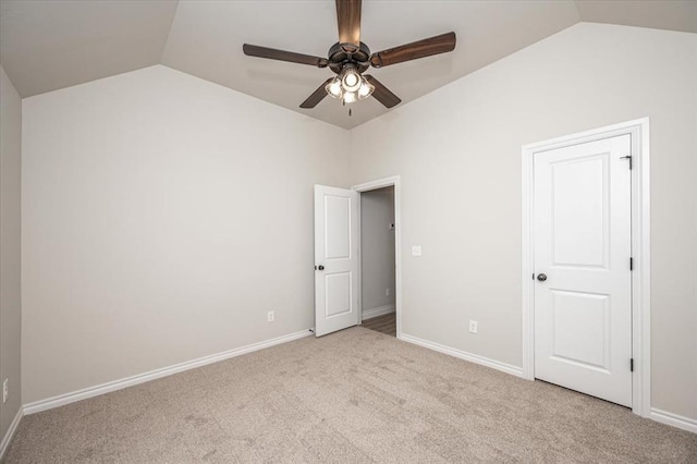11608 NW 104th St, Yukon, OK 73099 - unfurnished bedroom featuring baseboards, carpet flooring, and vaulted ceiling