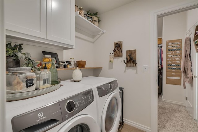 9304 NW 89th St, Yukon, OK 73099 - laundry area featuring washer and dryer, cabinet space, and light colored carpet