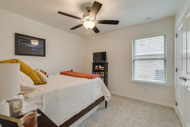 9304 NW 89th St, Yukon, OK 73099 - bedroom with multiple windows, carpet floors, and ceiling fan