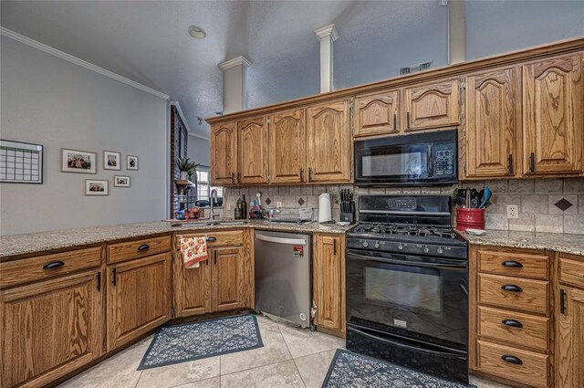 kitchen featuring a sink, tasteful backsplash, ornamental molding, and black appliances