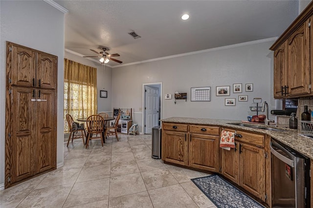 kitchen featuring ceiling fan, visible vents, stainless steel dishwasher, a sink, and ornamental molding
