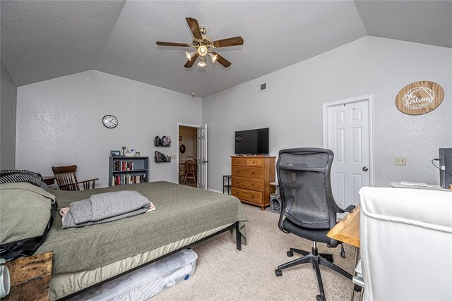 bedroom featuring ceiling fan, carpet, and vaulted ceiling