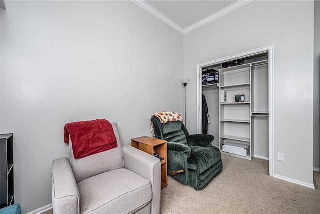 living area featuring baseboards, ornamental molding, and carpet
