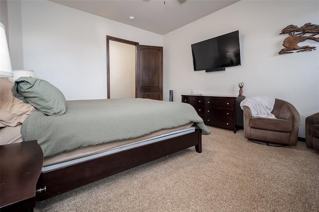bedroom with light carpet