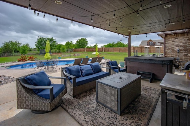 view of patio with a fenced in pool, a fenced backyard, a hot tub, and an outdoor living space