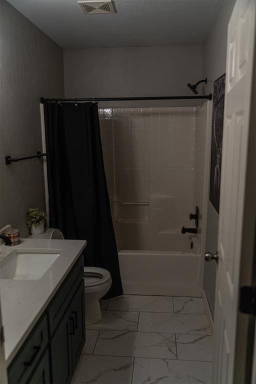 bathroom with vanity, toilet, shower / bathtub combination with curtain, marble finish floor, and visible vents