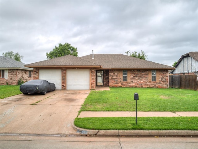 single story home with fence, a front lawn, brick siding, a garage, and driveway