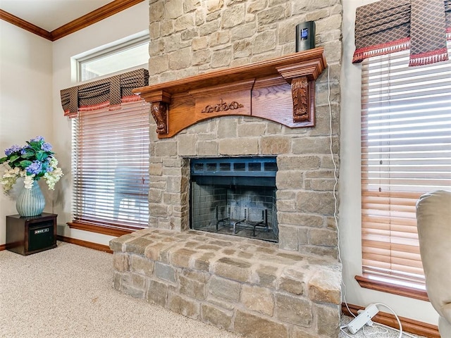 room details featuring baseboards, ornamental molding, carpet, and a stone fireplace