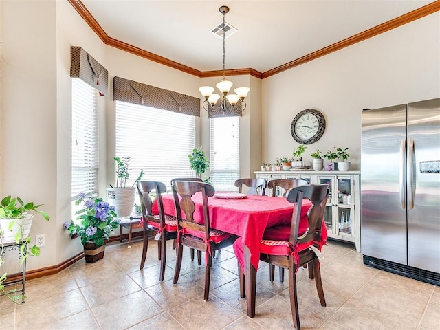 dining area with visible vents, crown molding, an inviting chandelier, baseboards, and light tile patterned floors