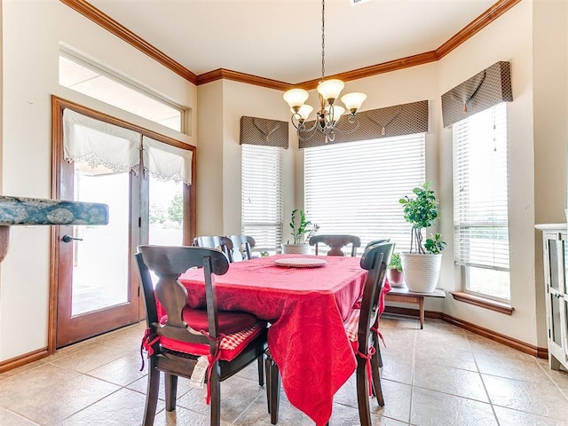 dining space featuring light tile patterned floors, baseboards, ornamental molding, and a chandelier
