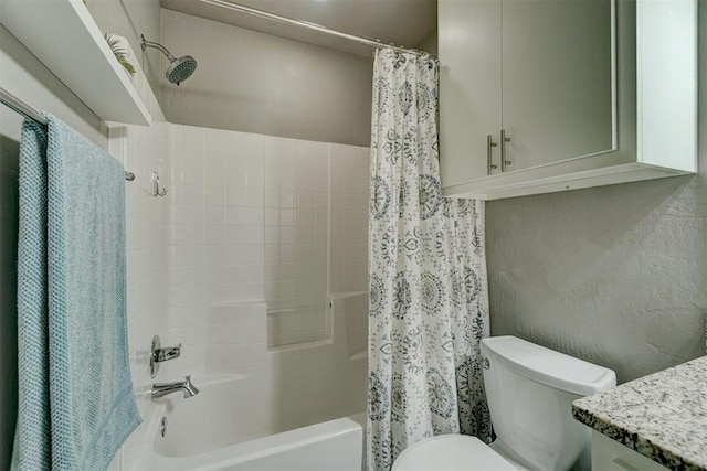 full bathroom featuring vanity, shower / bathtub combination with curtain, and toilet