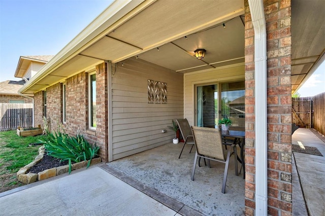 view of patio / terrace with fence and outdoor dining space