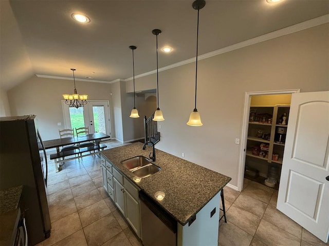 kitchen with a kitchen island with sink, crown molding, appliances with stainless steel finishes, a sink, and light tile patterned floors
