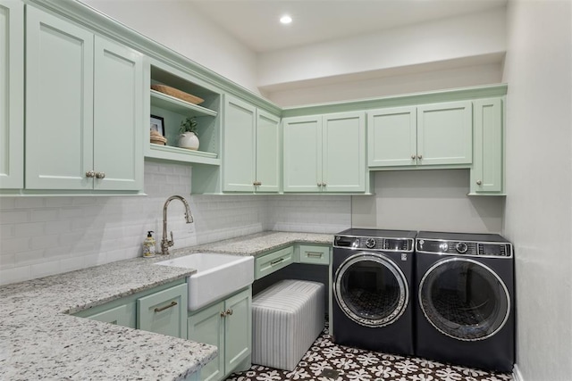 laundry area featuring cabinet space and washer and dryer