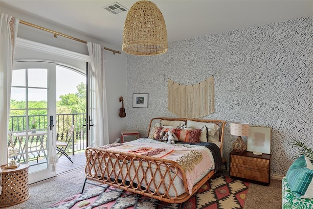 bedroom with access to outside