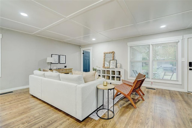 living room featuring baseboards, recessed lighting, wood finished floors, and visible vents