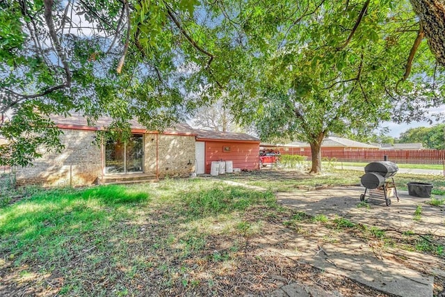 view of yard with fence