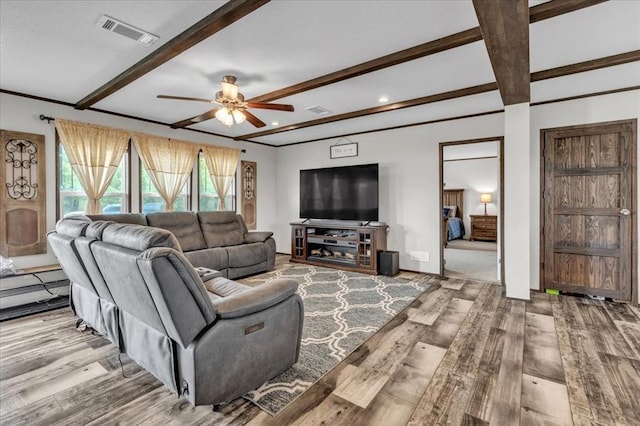 25386 Patterson Rd, Tecumseh, OK 74873 - living area with ceiling fan, wood finished floors, beam ceiling, baseboards, and recessed lighting
